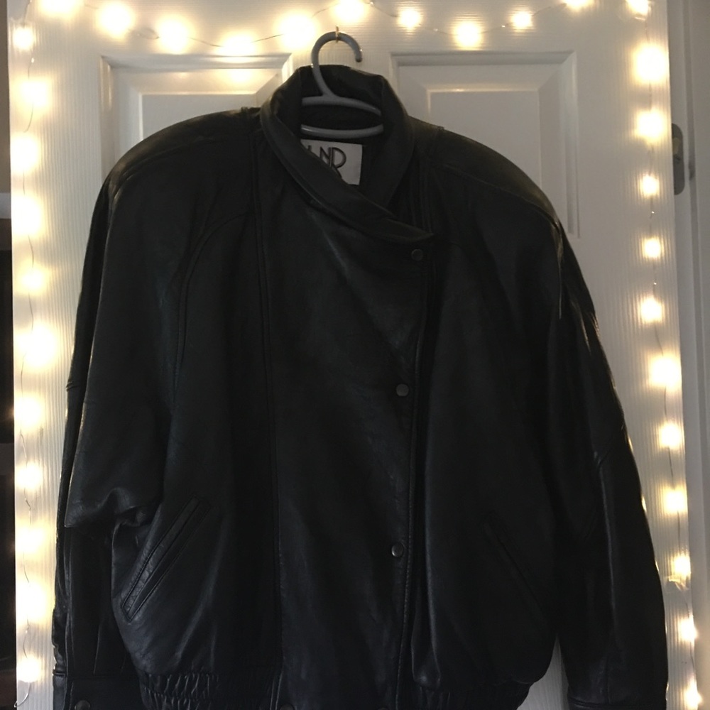 Leather waist length jacket with slightly padded shoulders